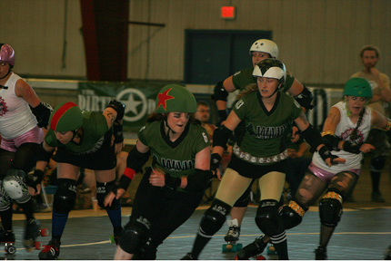 skaters crash into each other