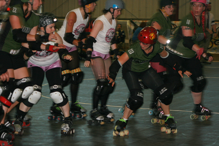pack of skaters jumbles together